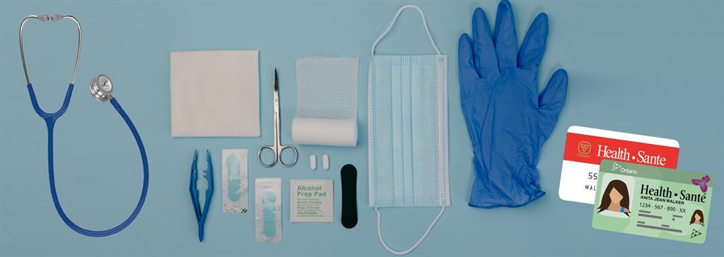 Various medical supplies and sample health cards